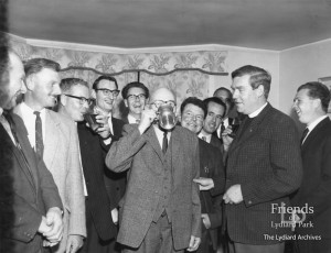 Photograph of Revd. Brian Carne & local men celebrating, c1965