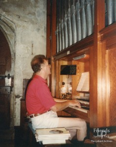 Photographs (2) of Malcolm Titcombe playing the organ at St. Mary's Lydiard Tregoze