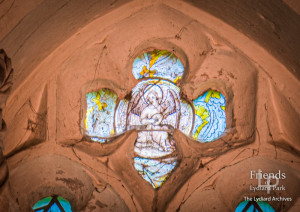 Medieval glass at St. Mary's Lydiard Tregoze: Angel playing a lute & heraldry