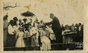 Photograph of Vernon St.John crowning carnival queen, 1927