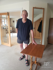 Photograph of Mr James Woolford of Hook Farm and Bolingbroke table, 2022