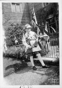Photograph of George Rumming in coronation fancy dress, 1937