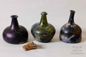 Archaeological finds - glass bottles & shoe parts, 1972