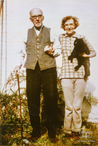 Photograph of 6th Viscount Bolingbroke and Miss Catherine McLean with cat, c1971