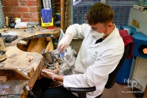 Photographs (4) of Lyle Bowles cleaning rose bowl at Deacon & Sons Ltd, Swindon, 2024