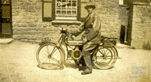 Photograph of Bertie Thale (Bert) Strange on motorbike 1923