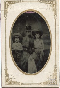 Studio portrait of Mary Howard and sons, c1887